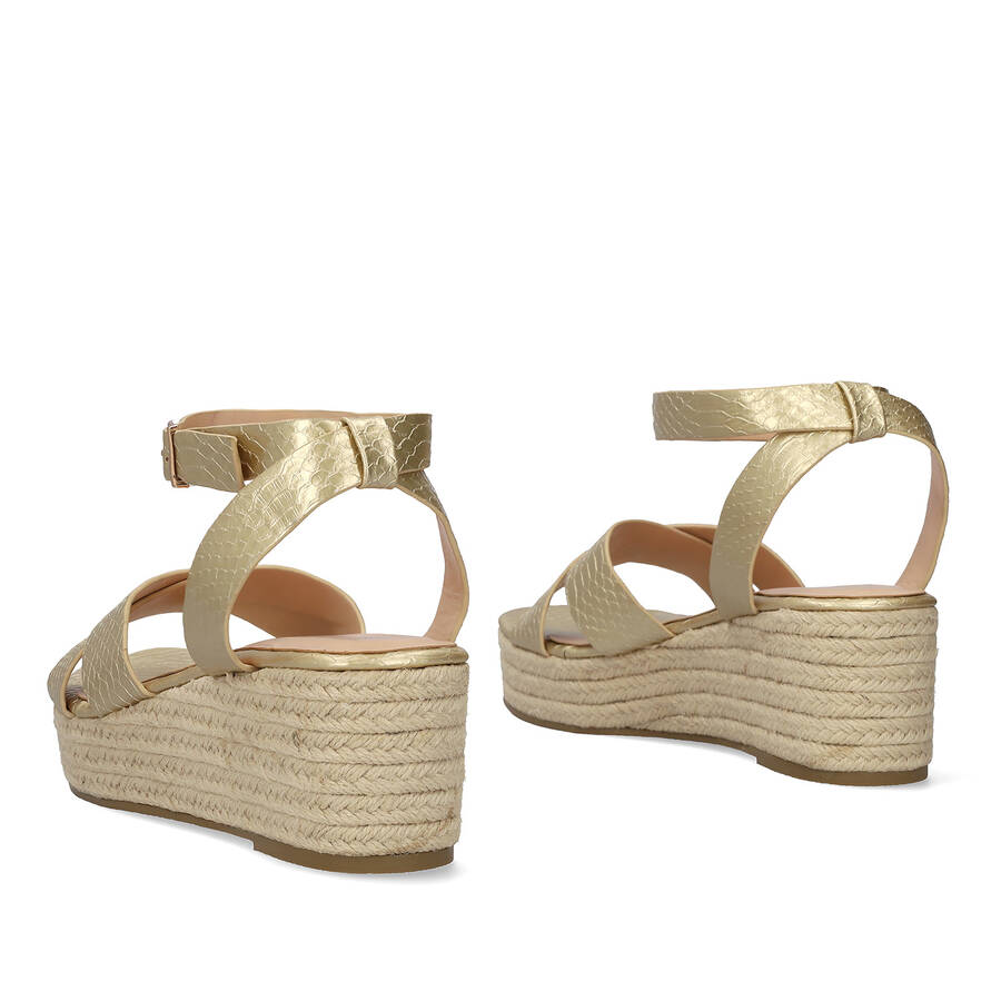 Gold sandals in soft coco material and jude wedge 