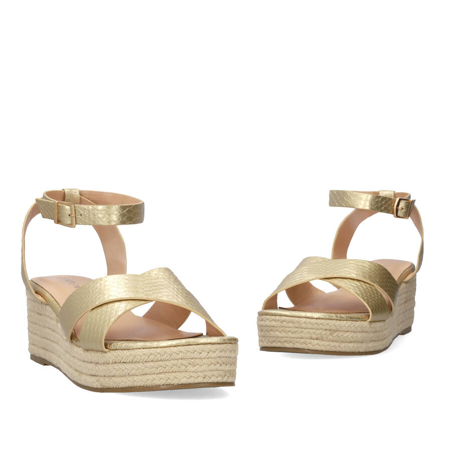 Gold sandals in soft coco material and jude wedge 