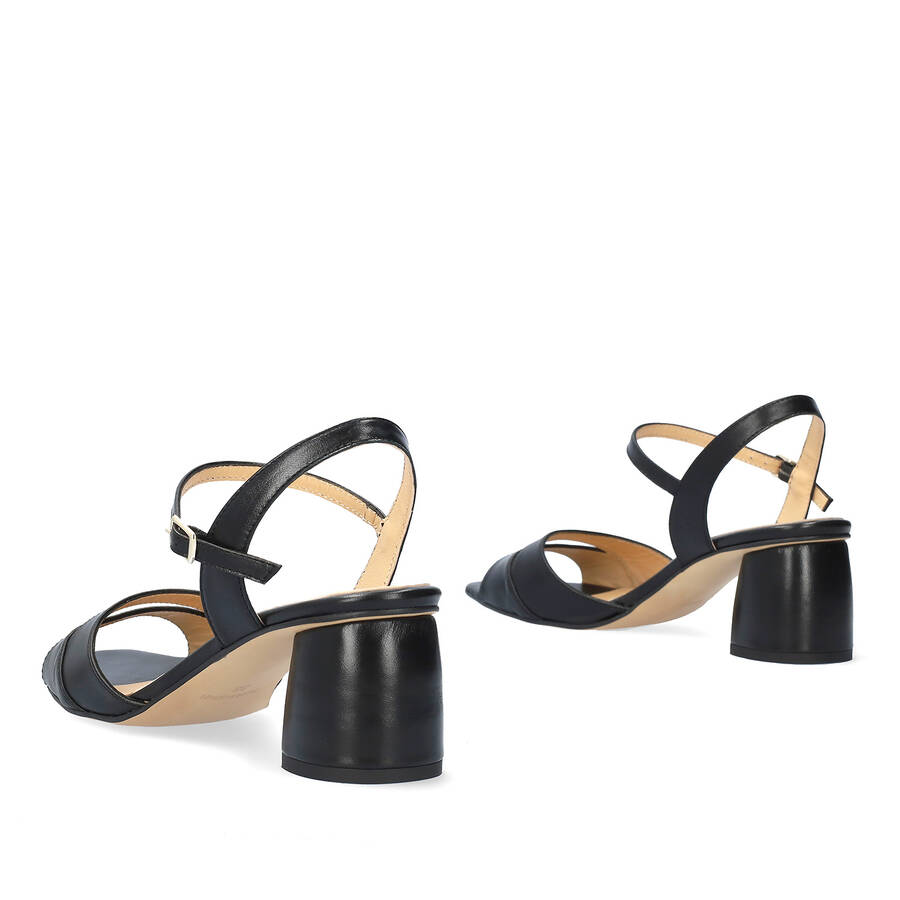 Heeled leather sandals in black colour 