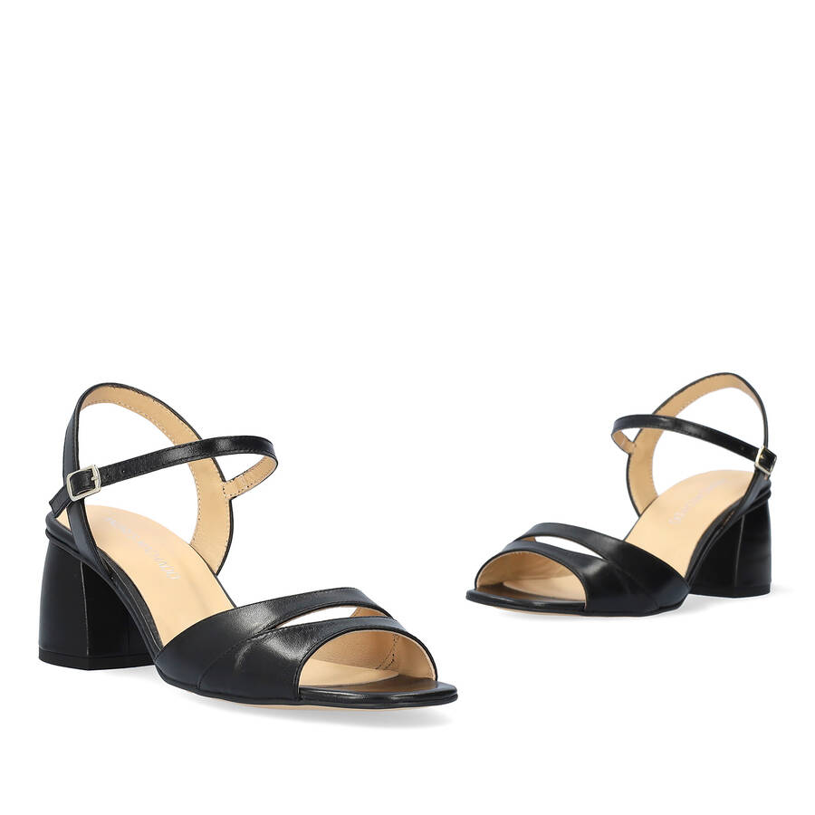 Heeled leather sandals in black colour 