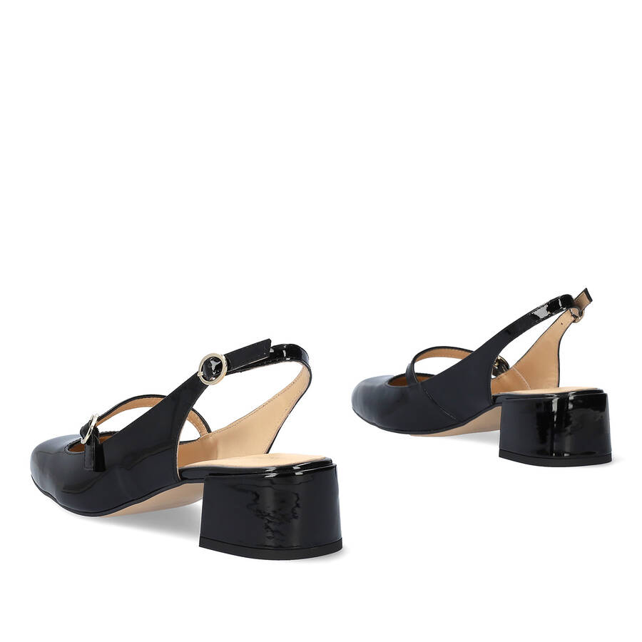 Heeled black patent leather Mary Janes 