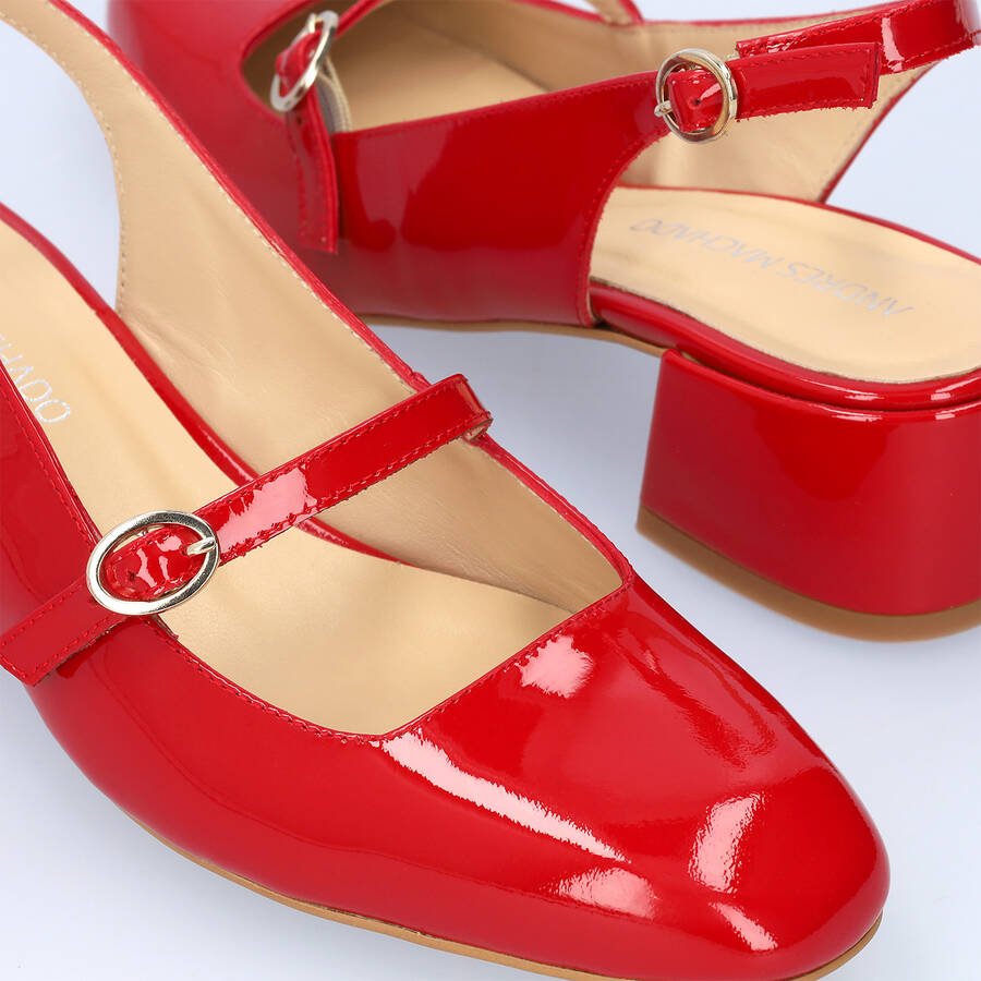 Heeled red patent leather Mary Janes 