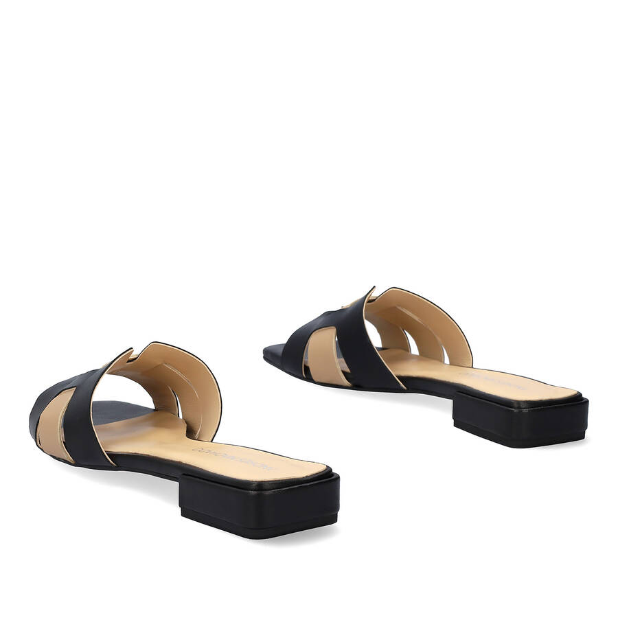 Flat sandals in black and beige leather 