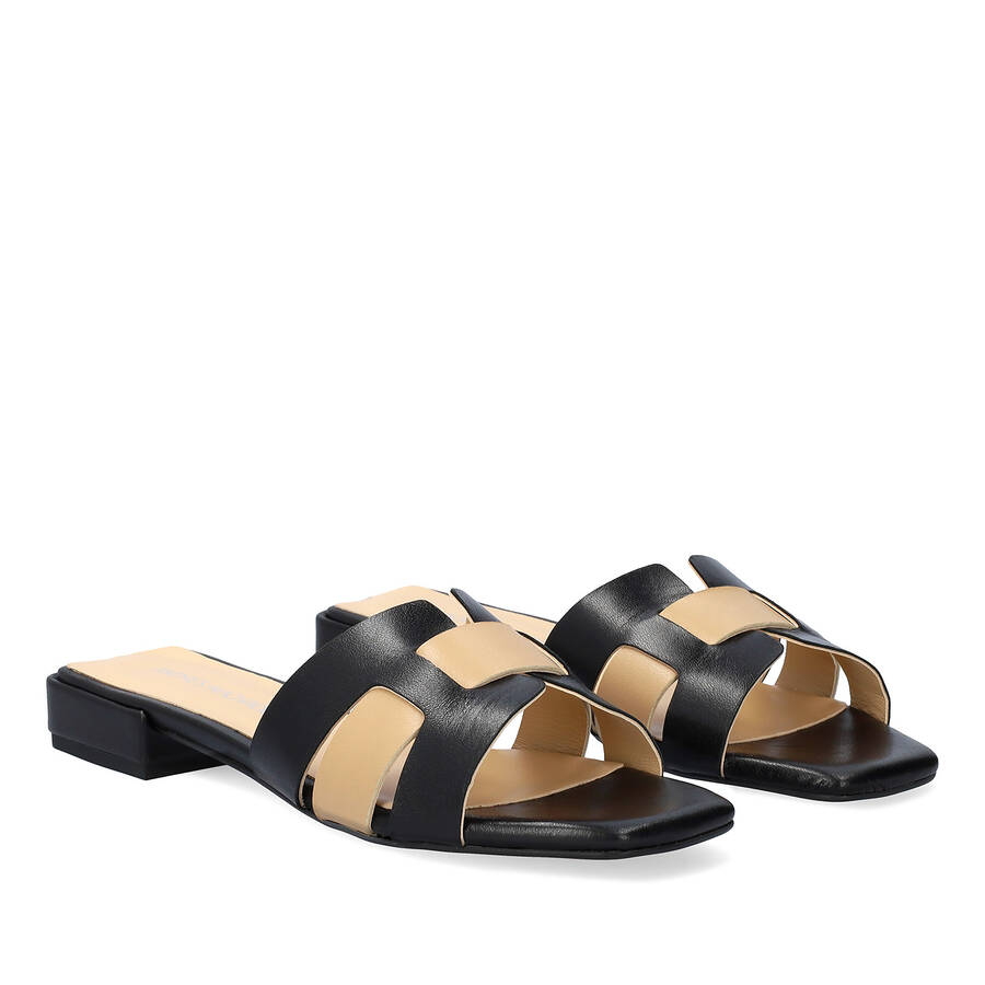 Flat sandals in black and beige leather 