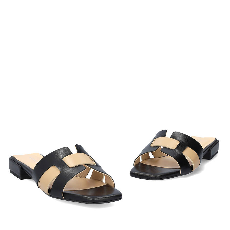 Flat sandals in black and beige leather 