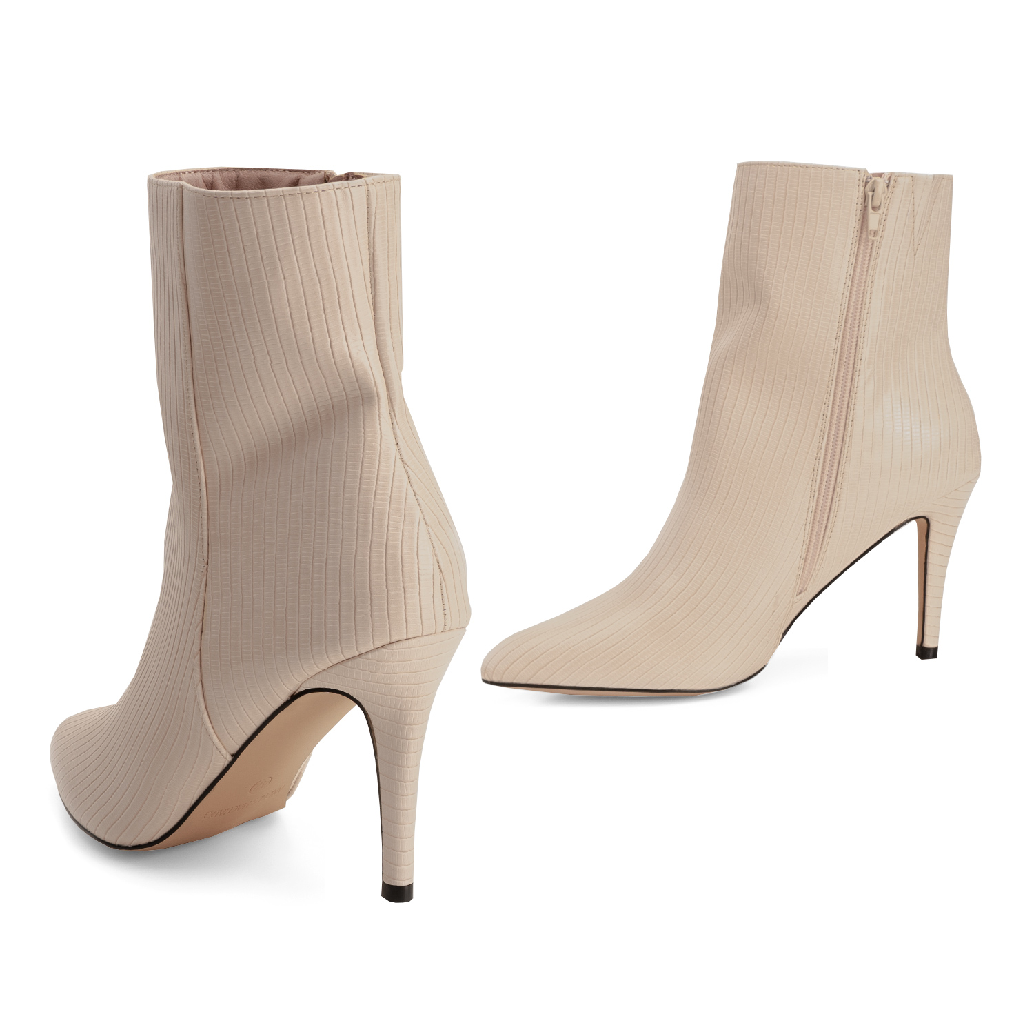 Pointed toed booties in ivory embossed faux leather 
