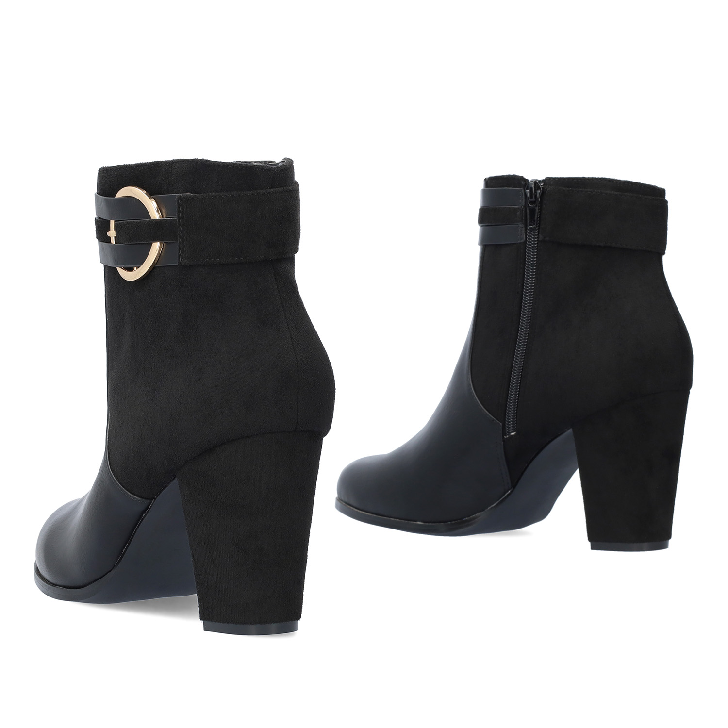 High heeled combined black colour bootie. 
