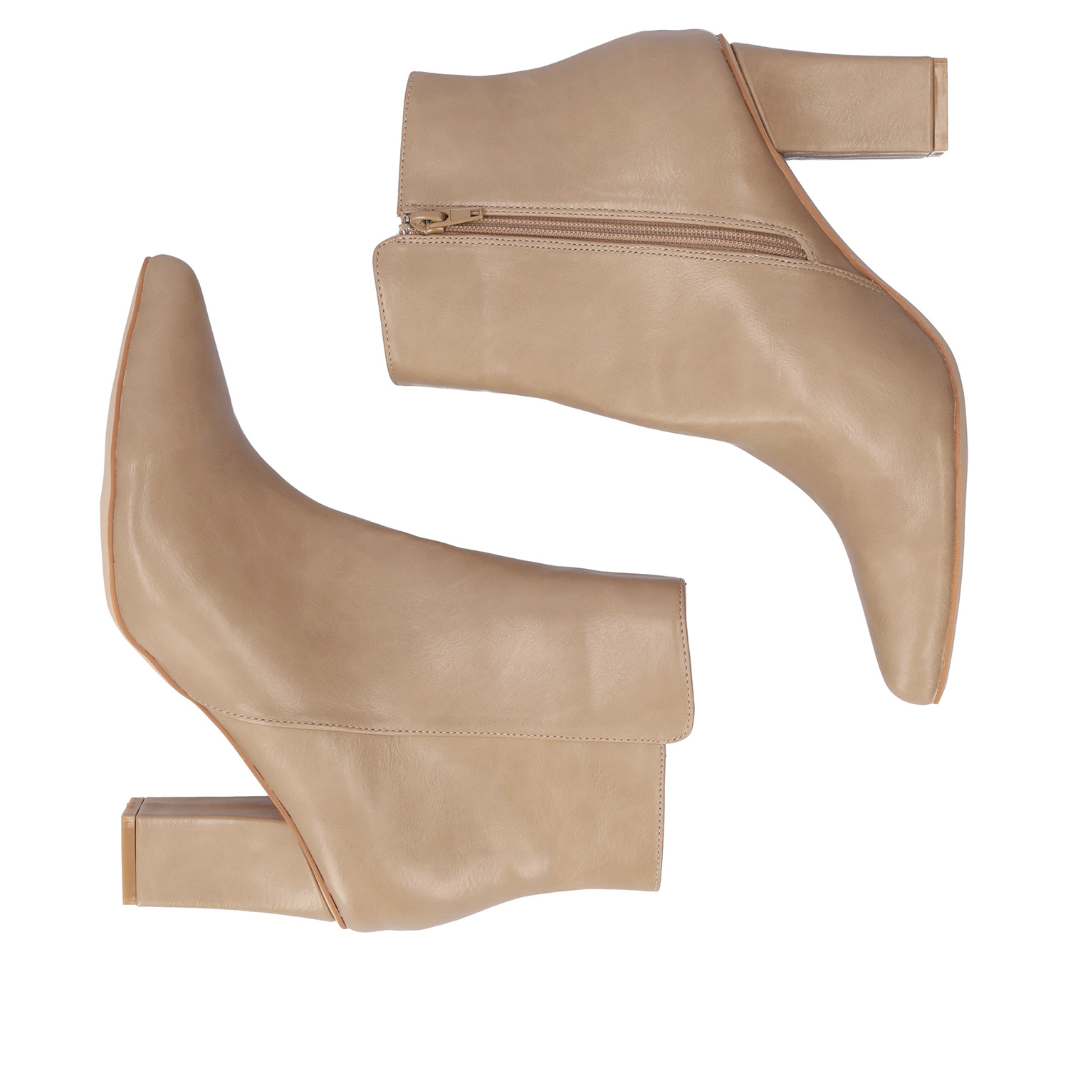 Heeled booties in beige faux leather. 