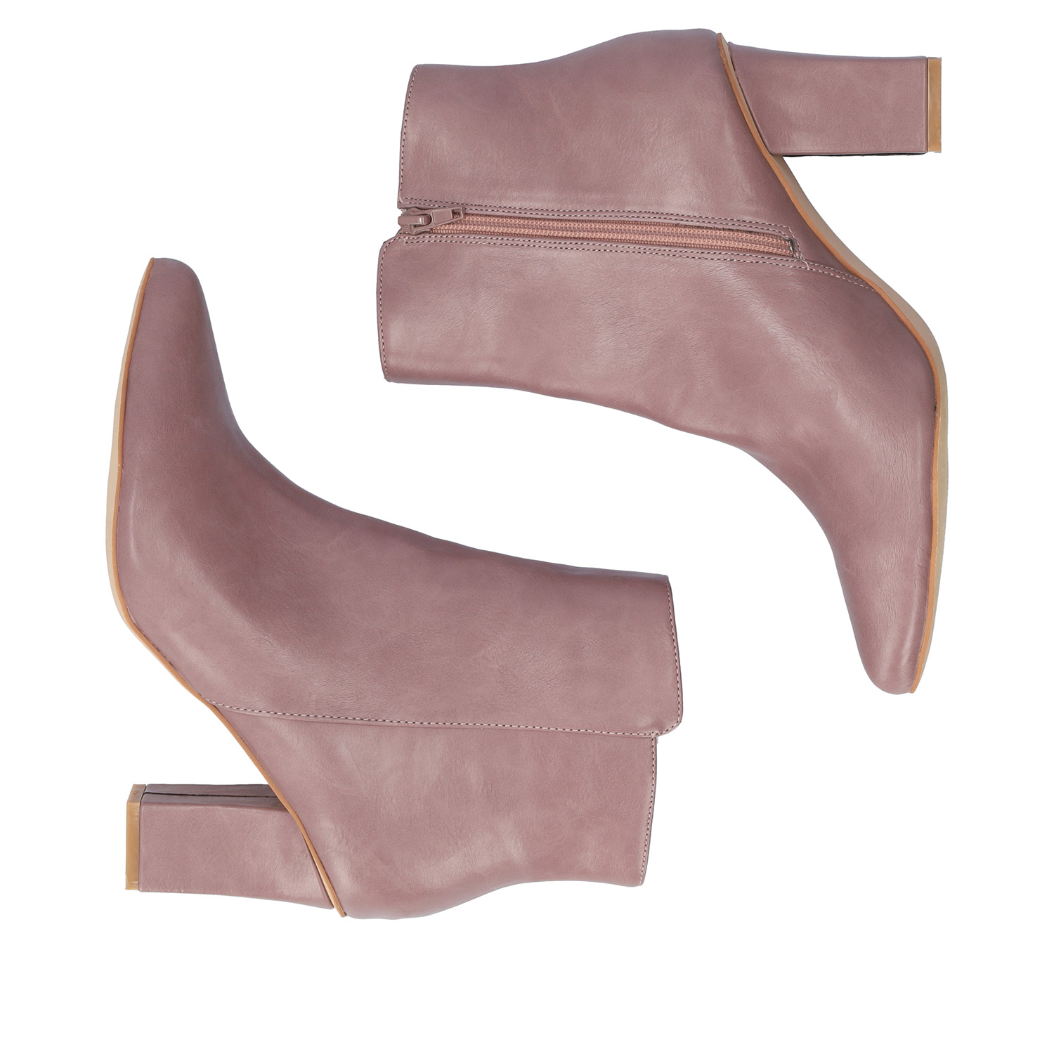 Heeled booties in mauve faux leather. 