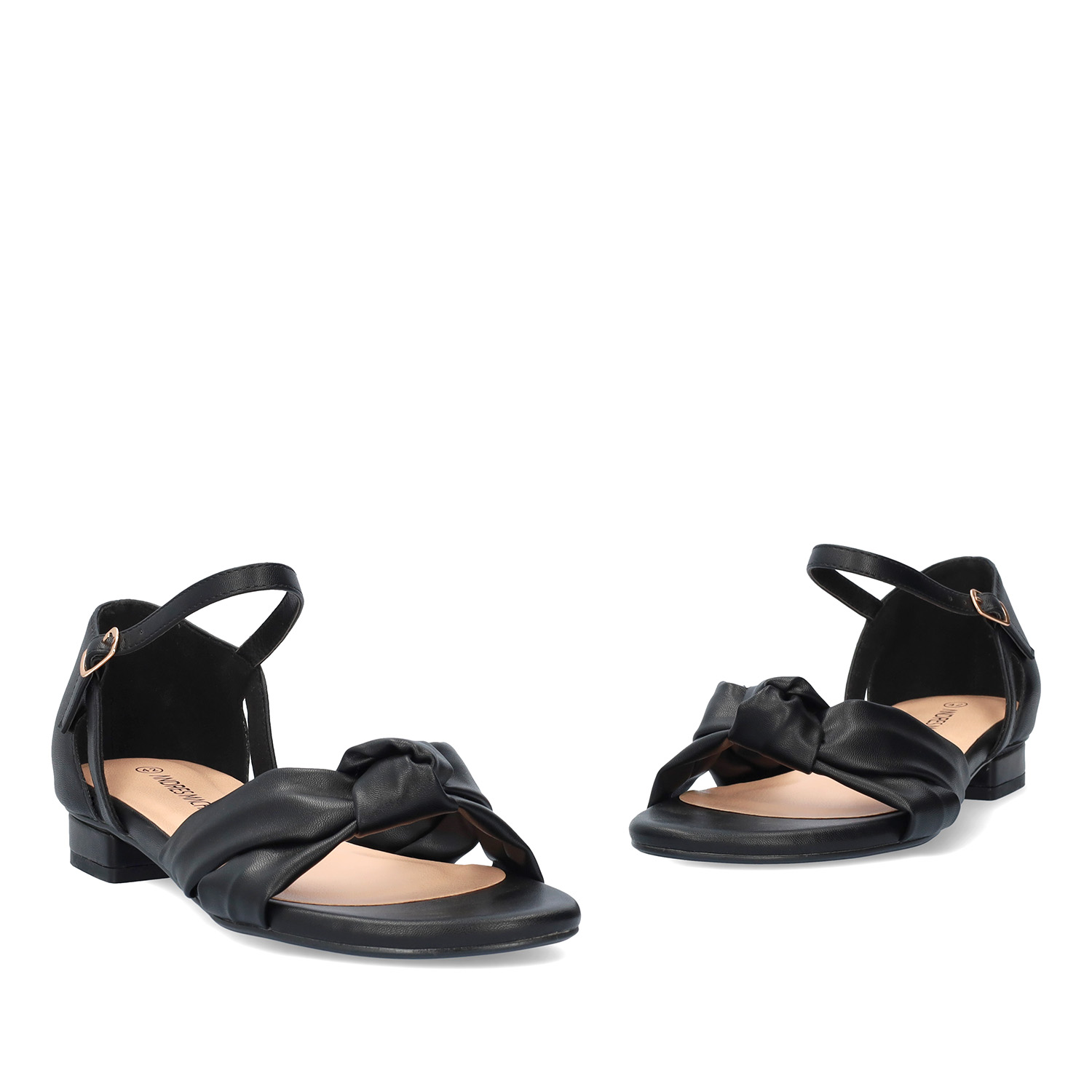 Flat sandals in soft black colored material 