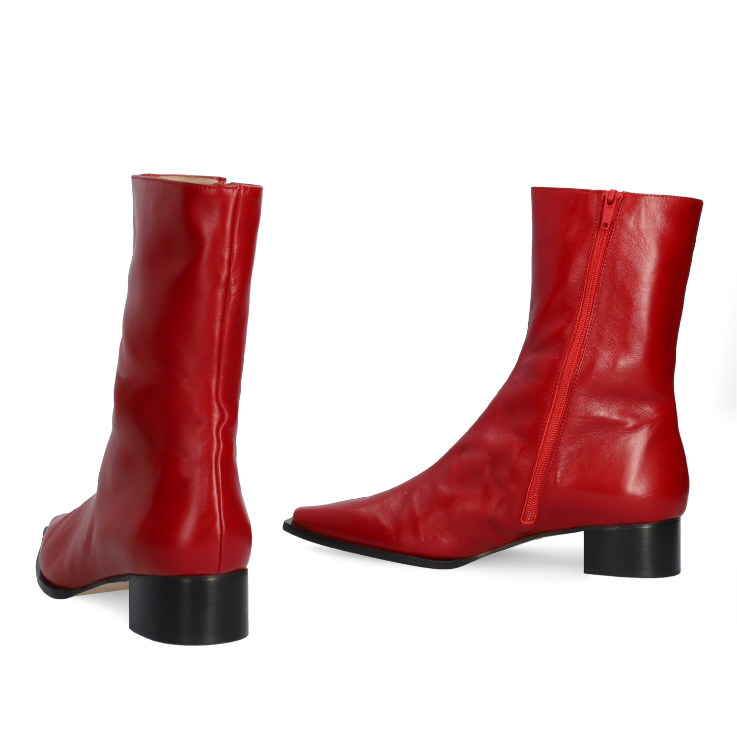 Heeled booties in red leather 