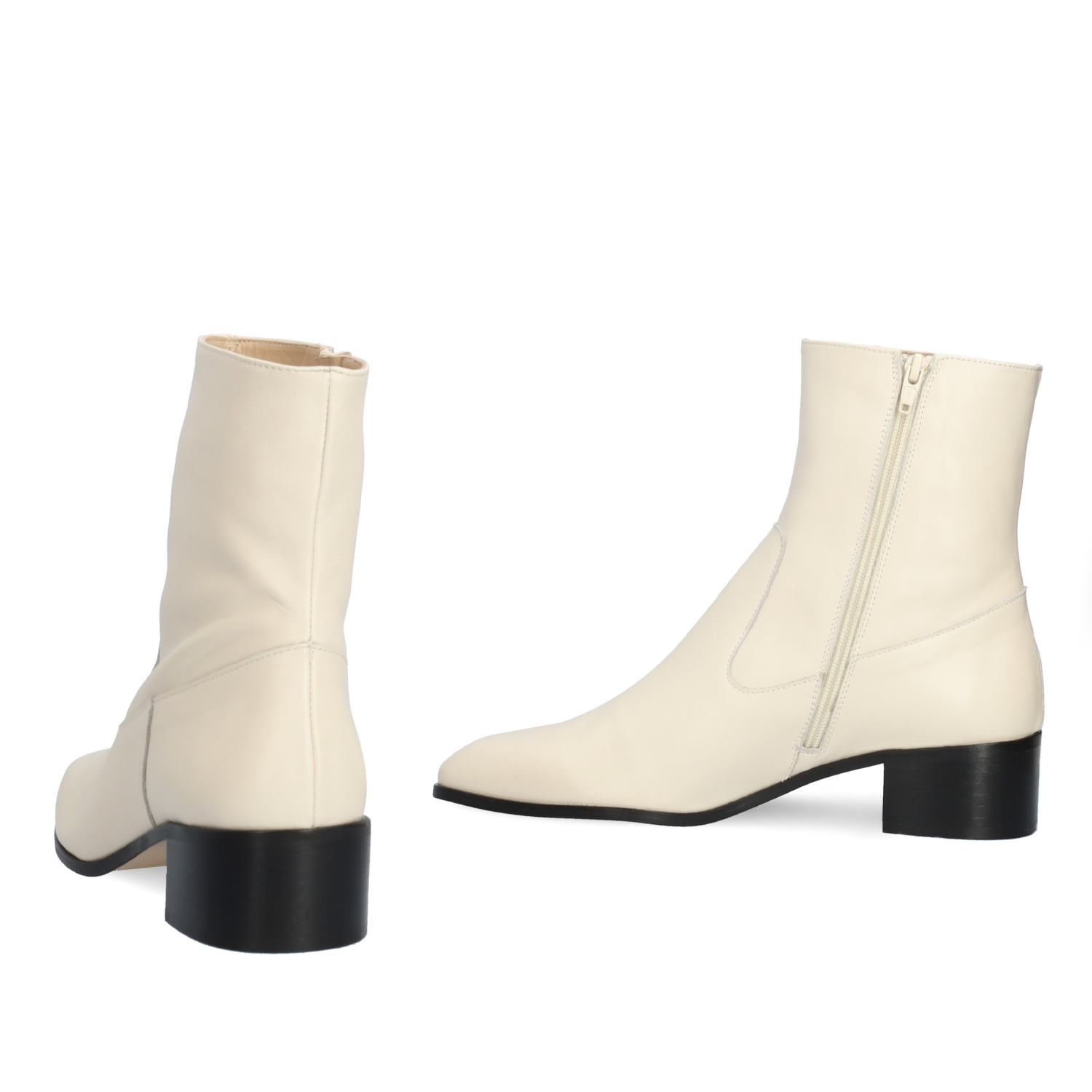 Heeled booties in off-white leather 