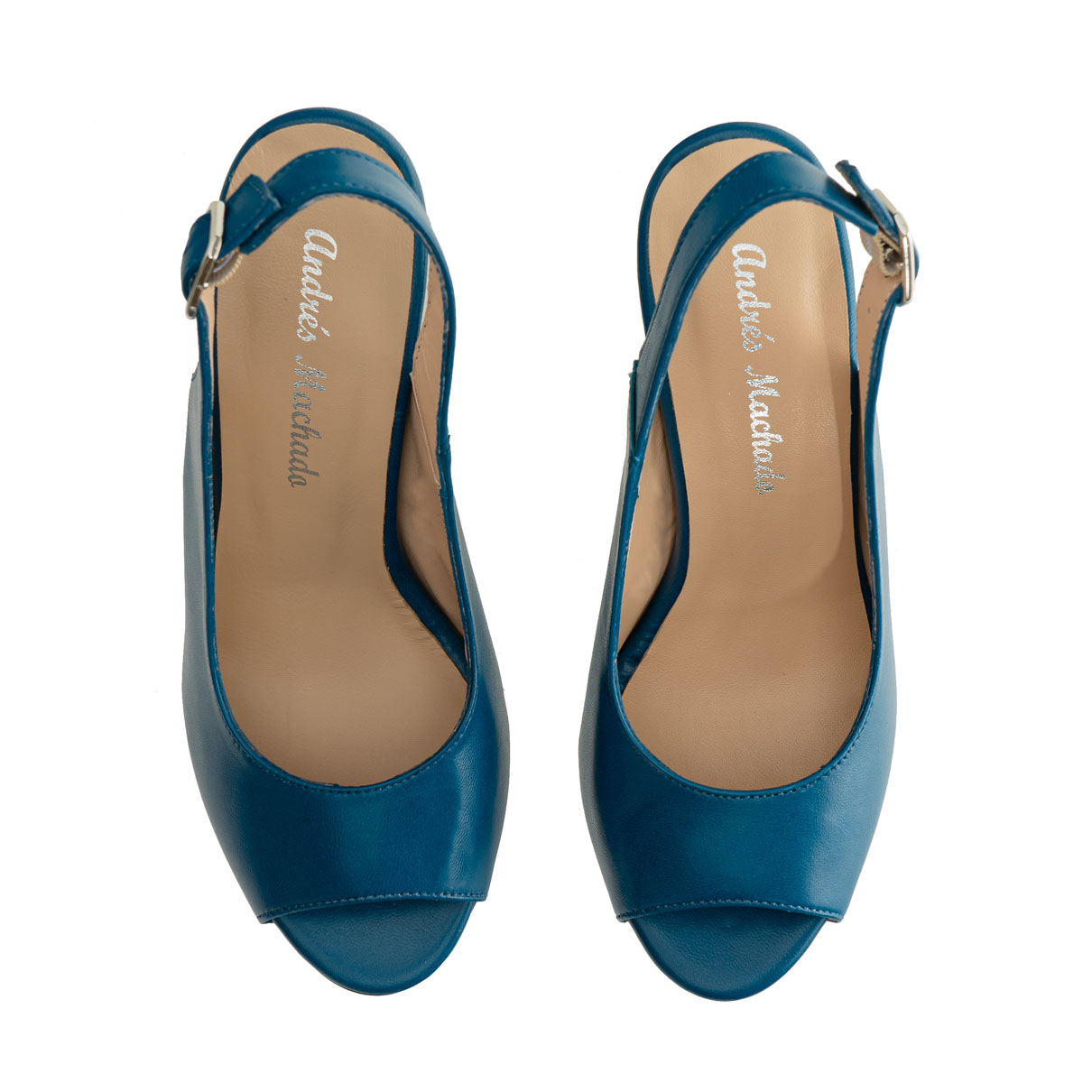 Chaussures talons en cuir couleur Azul ouvertes à l´arrière. 