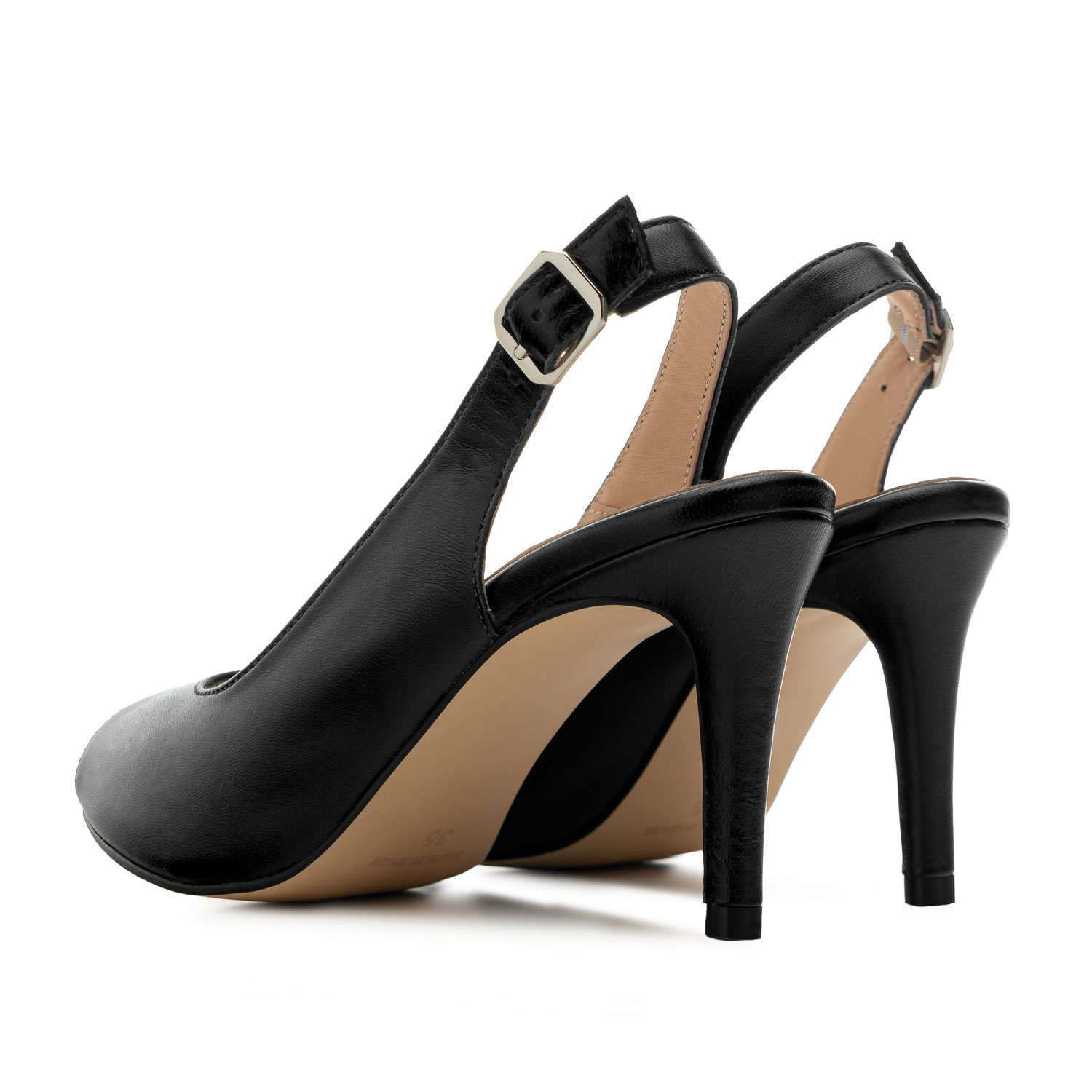 Chaussures talons en cuir couleur Noir ouvertes à l´arrière. 