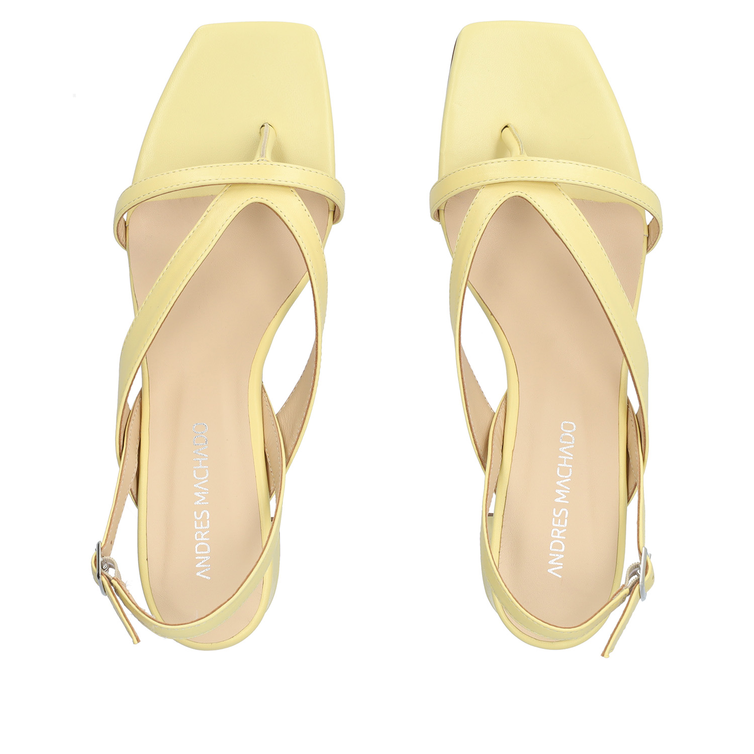 Heeled sandals in yellow leather 