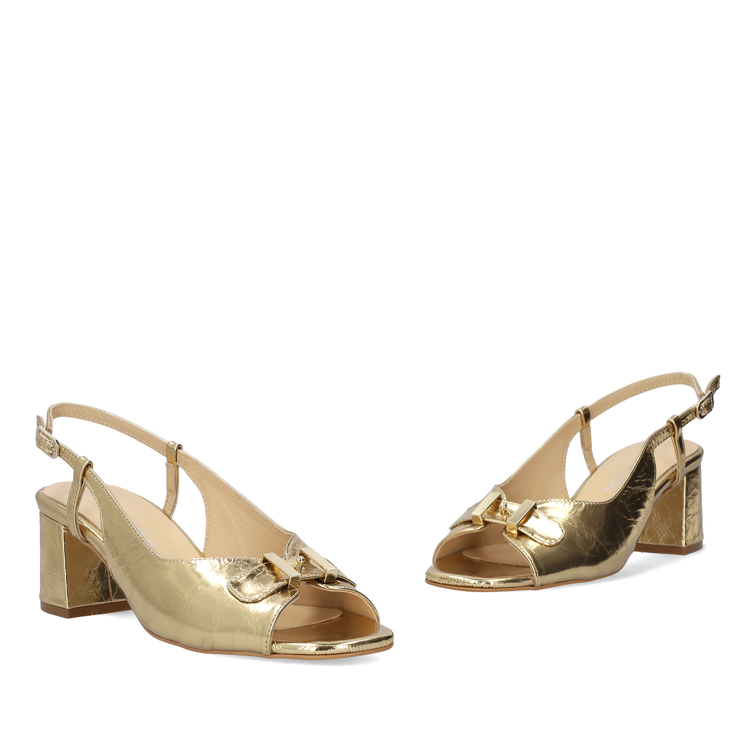 Heeled sandals in golden leather 