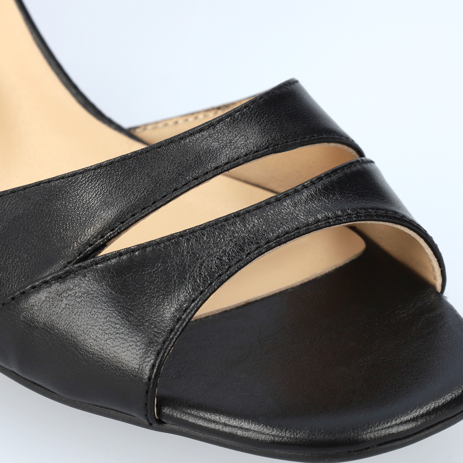 Heeled leather sandals in black colour 